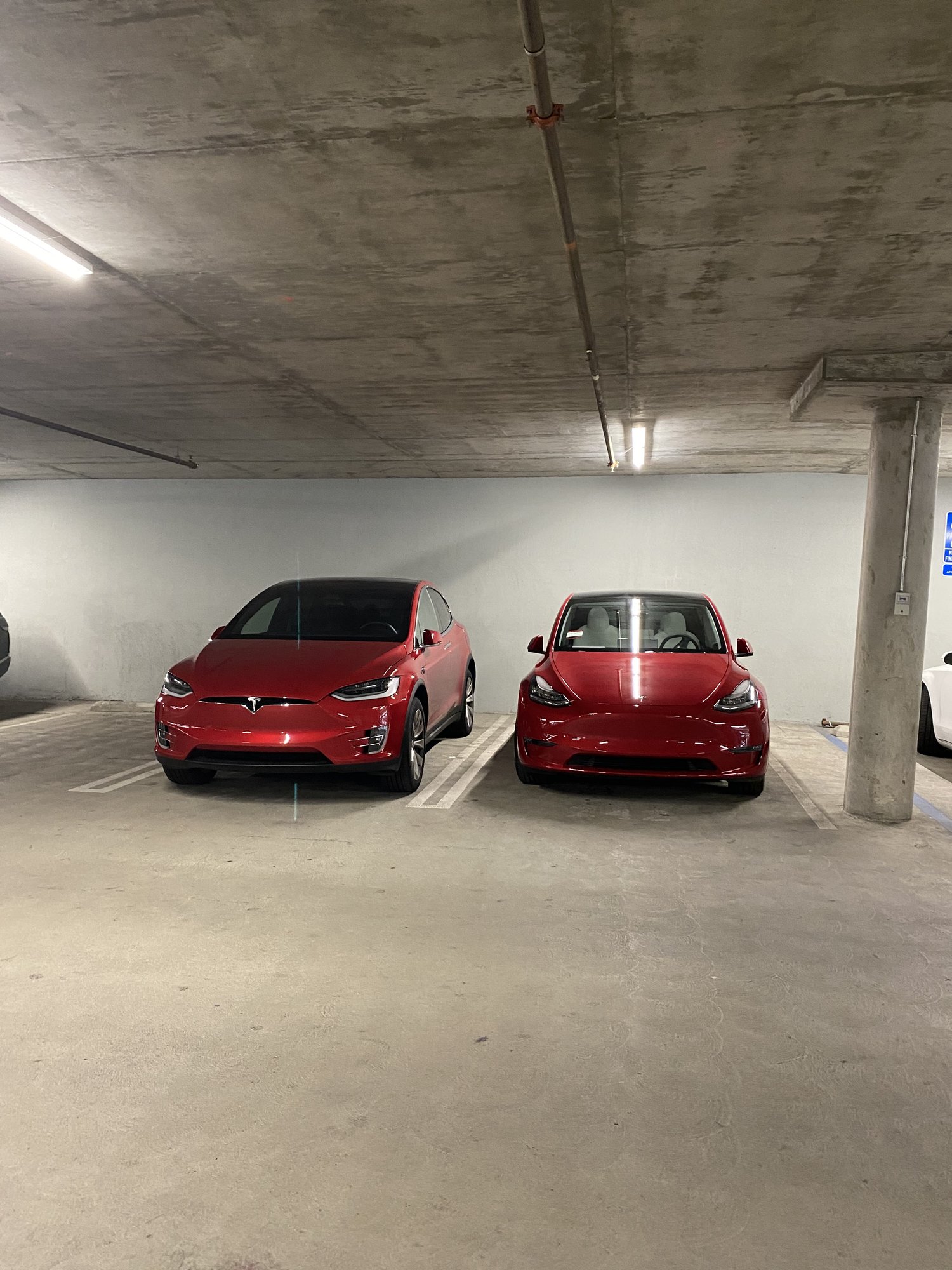 Tesla model y red store with white interior