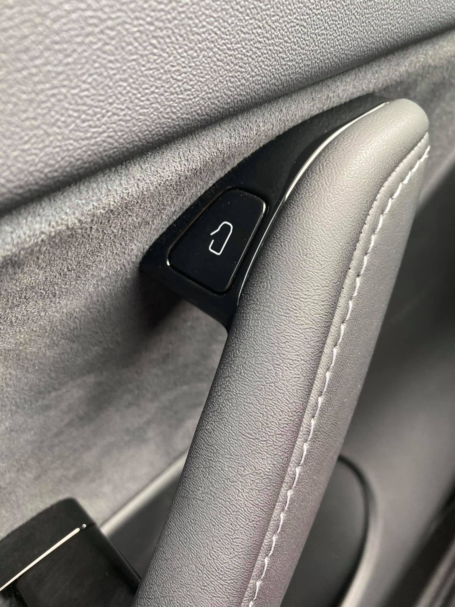 Tesla has incorporated new door exit buttons on the Model Y