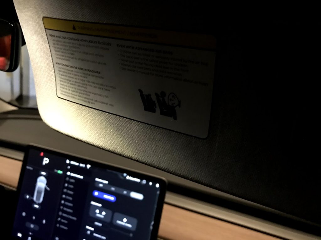 Tesla Model 3 airbag sticker visor