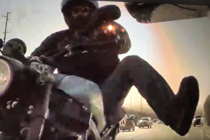 Bike road rage against Tesla