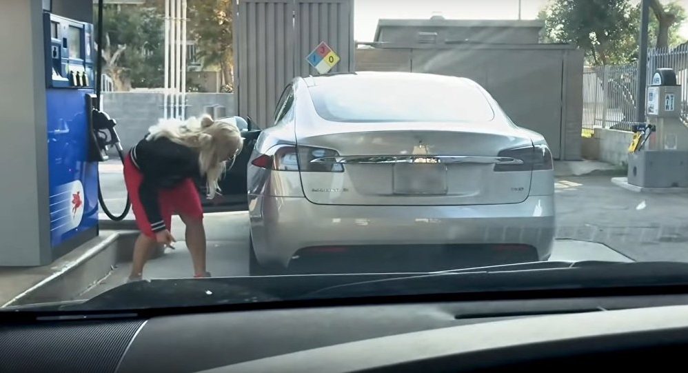 Tesla at gas station