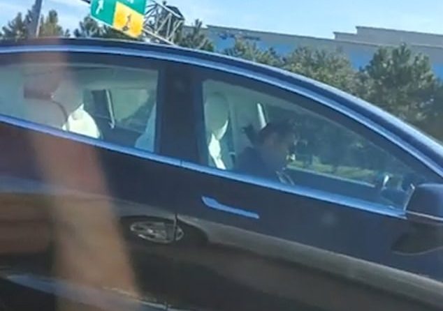 Tesla driver asleep behind the wheel