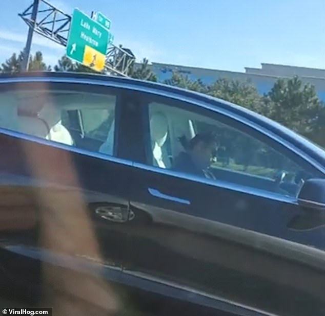 Tesla driver asleep behind the wheel