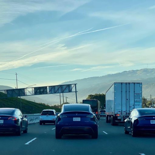 Blue Tesla Model Y and Model 3 size comparison
