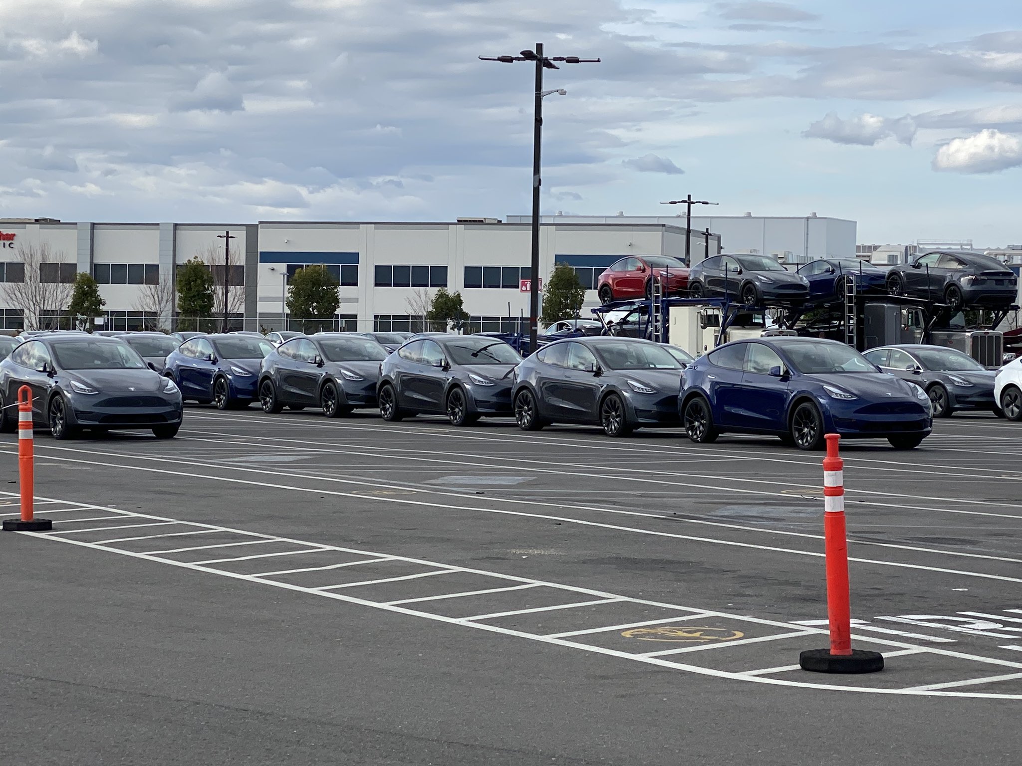 Truck loads of Tesla Model Y spotted leaving the factory as delivery