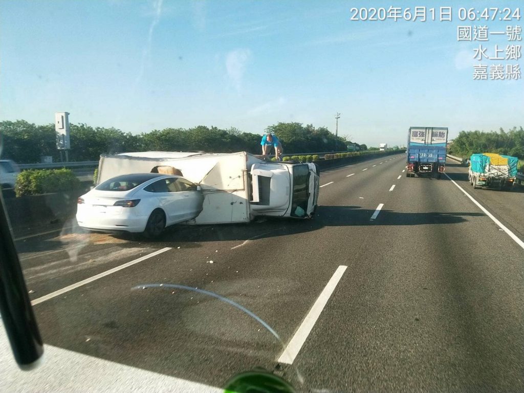 Tesla Model 3 owner walks away uninjured after crashing into overturned ...