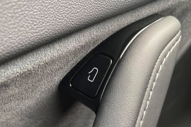 New Tesla Model Y door exit button