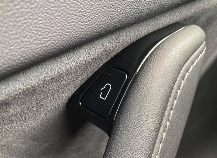 New Tesla Model Y door exit button