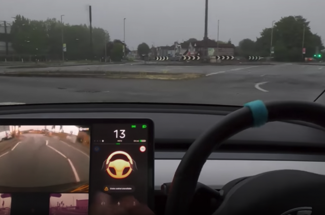 Tesla Driver Magic Roundabout Swindon