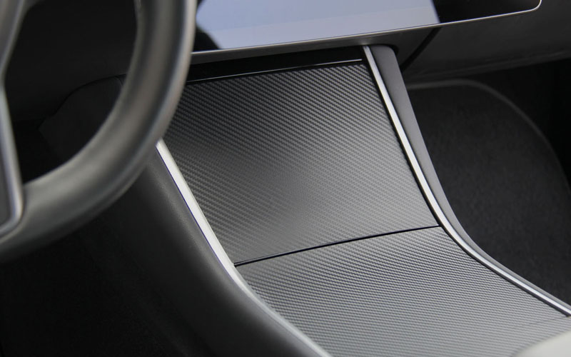 Tesloid carbon fiber center console wrap