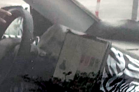 Camouflaged Tesla Model Y new dash close up