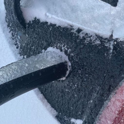 Tesla Frozen Charge Port TOO