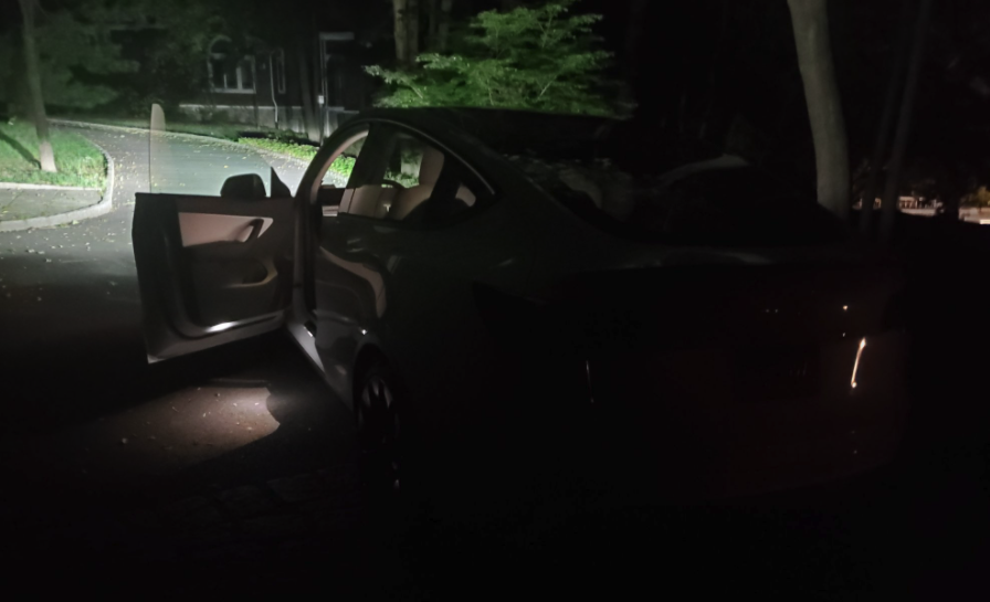 Tesla headlights on after exit