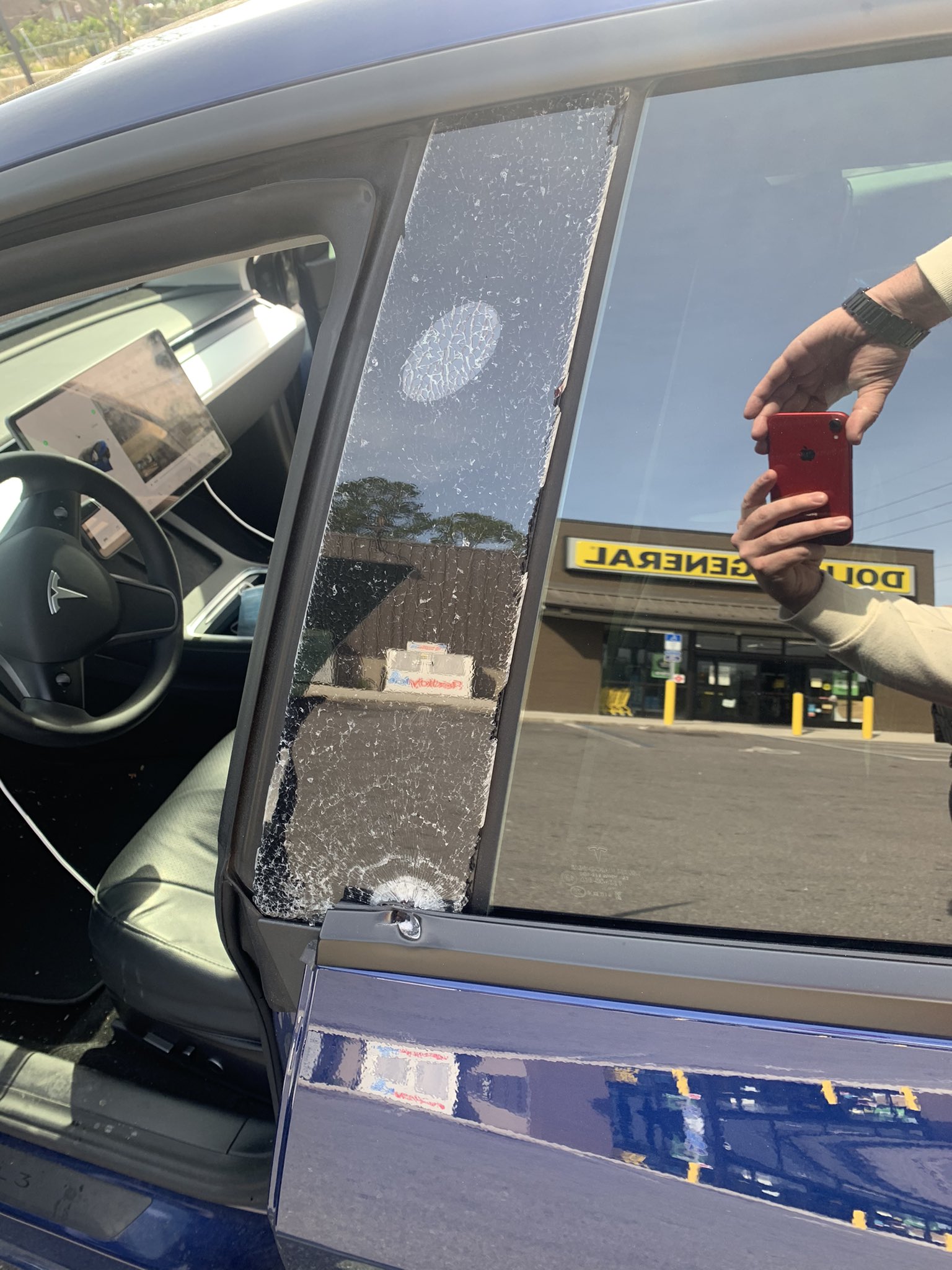 Bullet hole Tesla Model 3