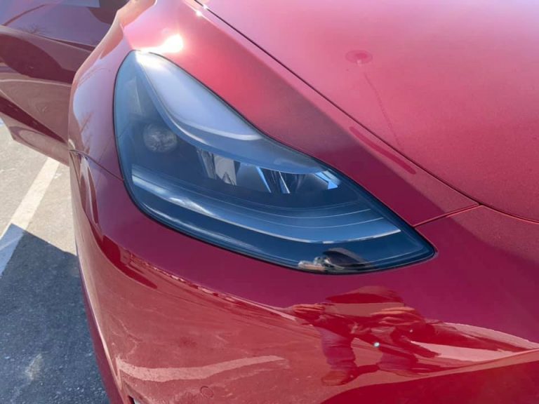 Tesla Model Y's with new headlights and updated center console now