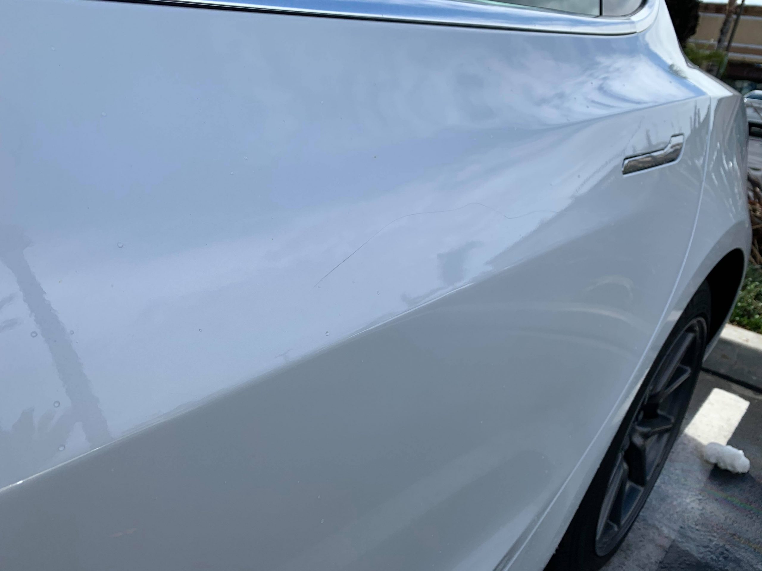 Tesla keying rear door