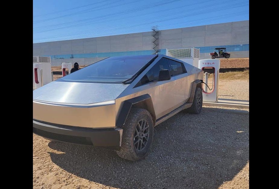 Tesla Cybertruck spotted plugged in to Giga Texas Superchargers Drive
