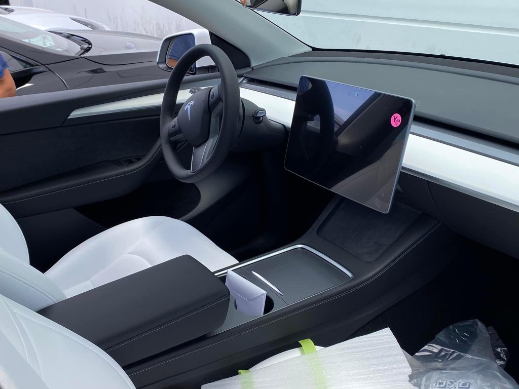 Tesla Model Y built at Fremont finally gets updated wood door panels