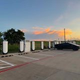 Supercharger at sunset with a Cybertruck