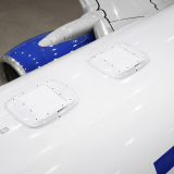 Starlink antenna domes on top of a United Airlines plane