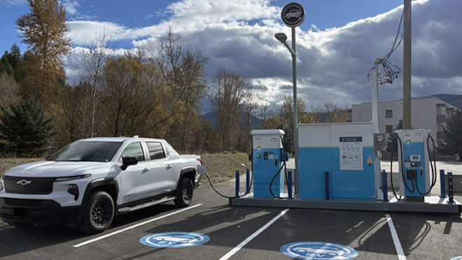 Portable EV charge site installed in a paved parking lot at the