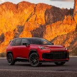Red 2026 Toyota RAV4 Plug-in Hybrid GR SPORT, front three-quarter view