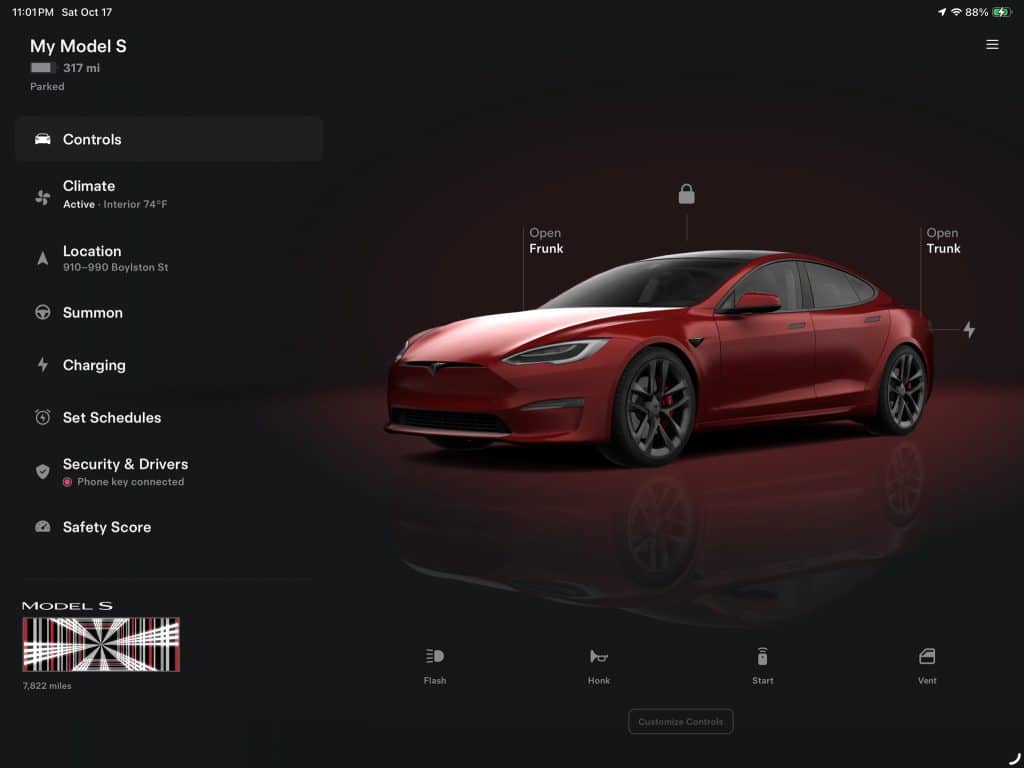 Tesla app two-column iPad layout with vehicle controls on the left and a large red Model S render on the right