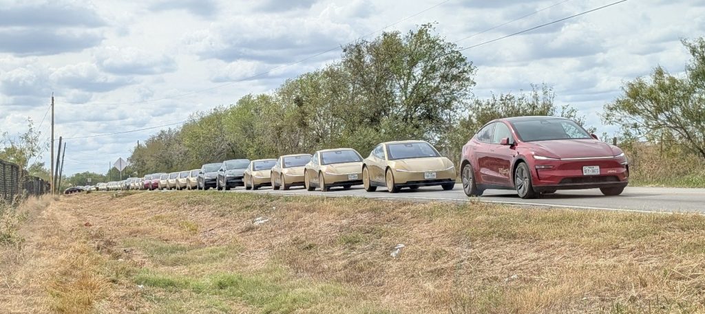 Line of gold Tesla Cybercabs and Model Y Robotaxis in Austin during F1 weekend