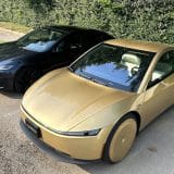 cybercab and tesla model 3 parked side by side
