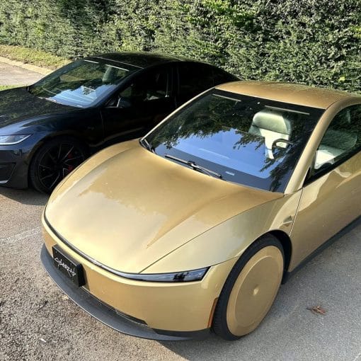 cybercab and tesla model 3 parked side by side