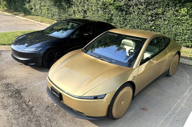cybercab and tesla model 3 parked side by side