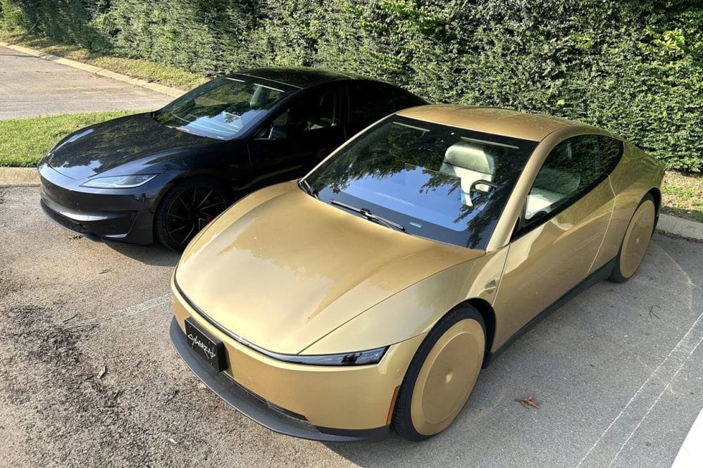 cybercab and tesla model 3 parked side by side