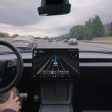 Tesla Model Y driving with FSD (Supervised) engaged on a highway