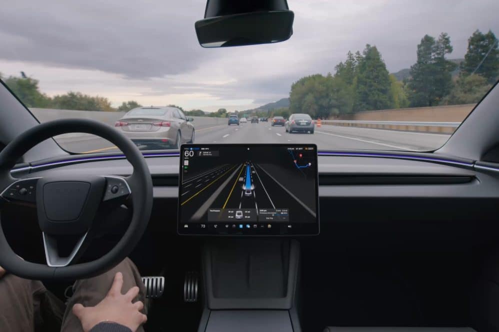 Tesla Model Y driving with FSD (Supervised) engaged on a highway