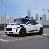A Waymo Jaguar I-Pace robotaxi, as Waymo seeks approval to operate driverless rides in Alberta