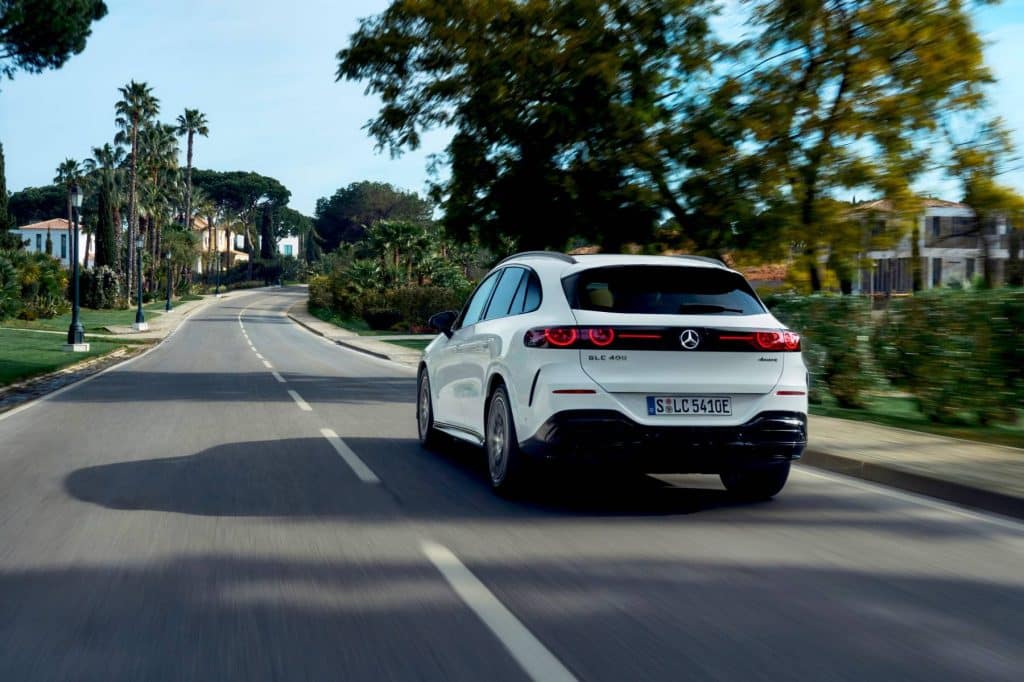 Rear view of the white Mercedes-Benz electric GLC driving on a Portuguese road