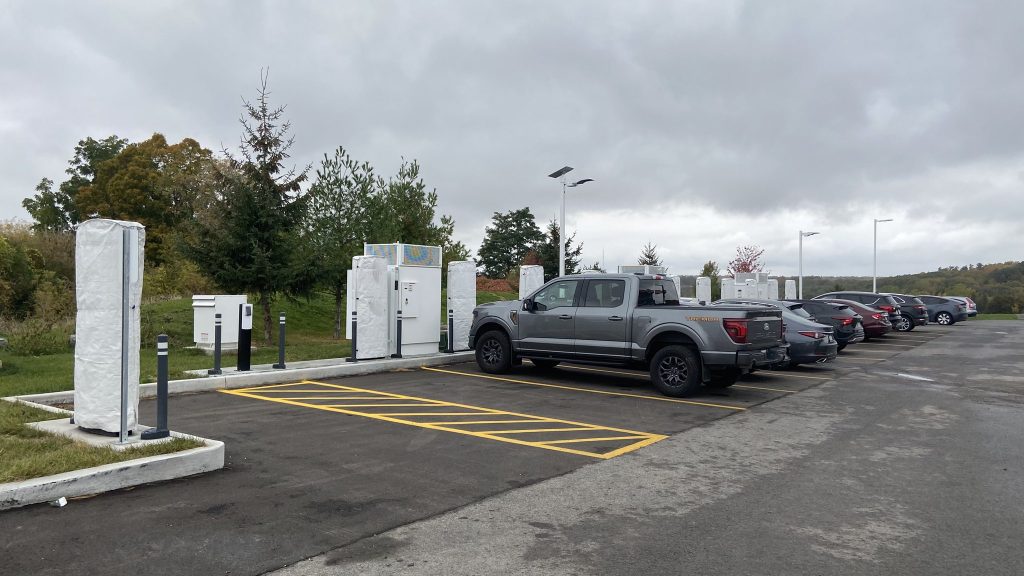 Tesla Supercharger in Kingston, Ontario with new payment terminal