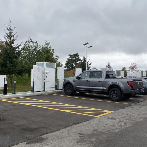 Tesla Supercharger in Kingston, Ontario with new payment terminal