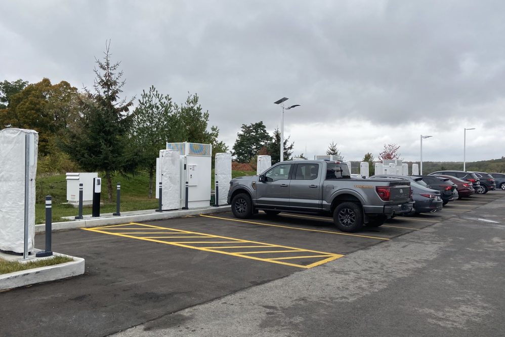 Tesla Supercharger in Kingston, Ontario with new payment terminal