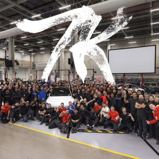 tesla employees celebrating 7000 model y vehicles at giga berlin in one week