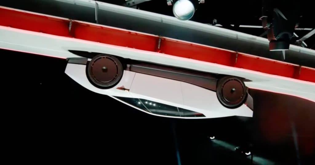 tesla roadster upside down from thurster system
