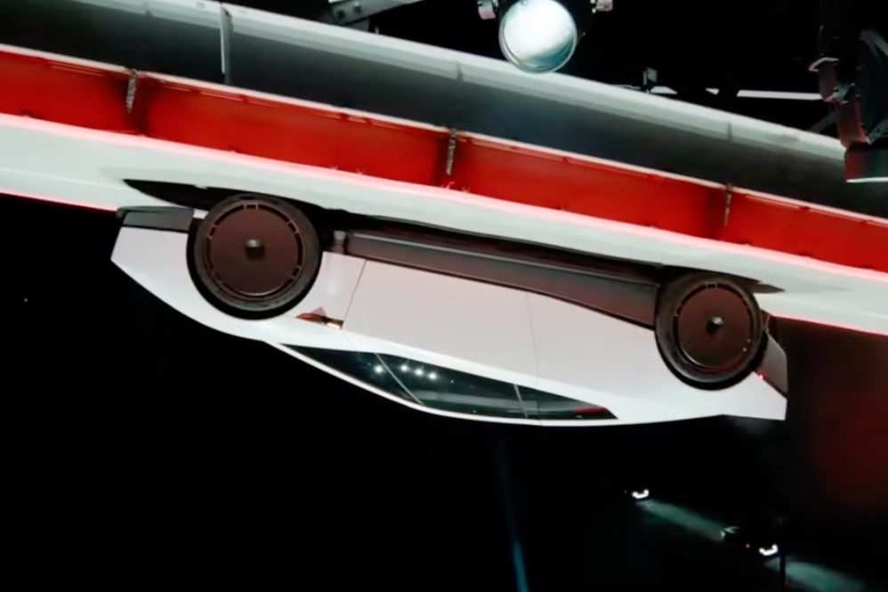 tesla roadster upside down from thurster system