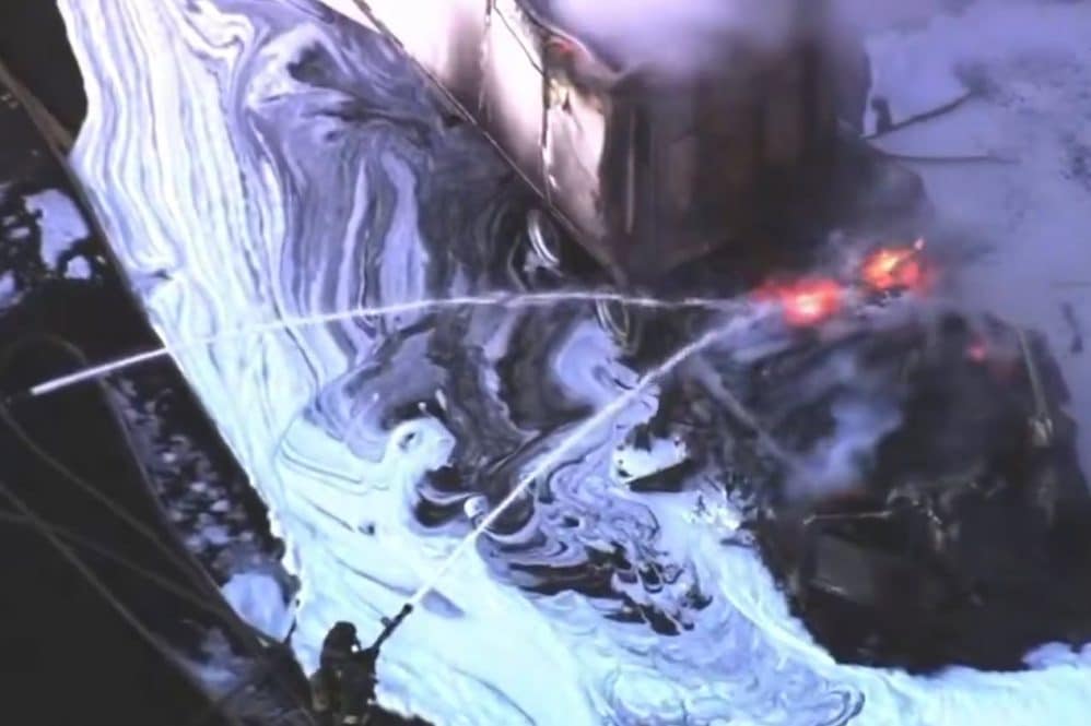 tesla semi on fire being extinguished