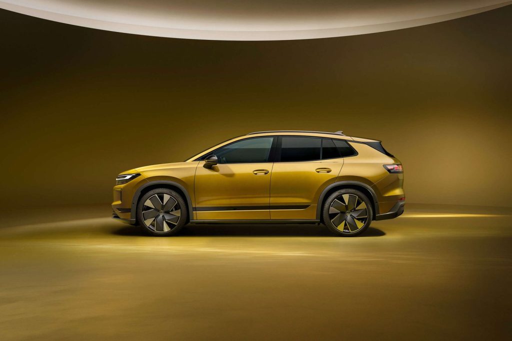 Side profile of the gold Volkswagen ID. Tiguan electric SUV