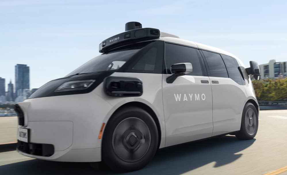 Waymo Ojai robotaxi driving on a city road