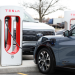 Ford Mach-e charging at a Tesla Supercharger